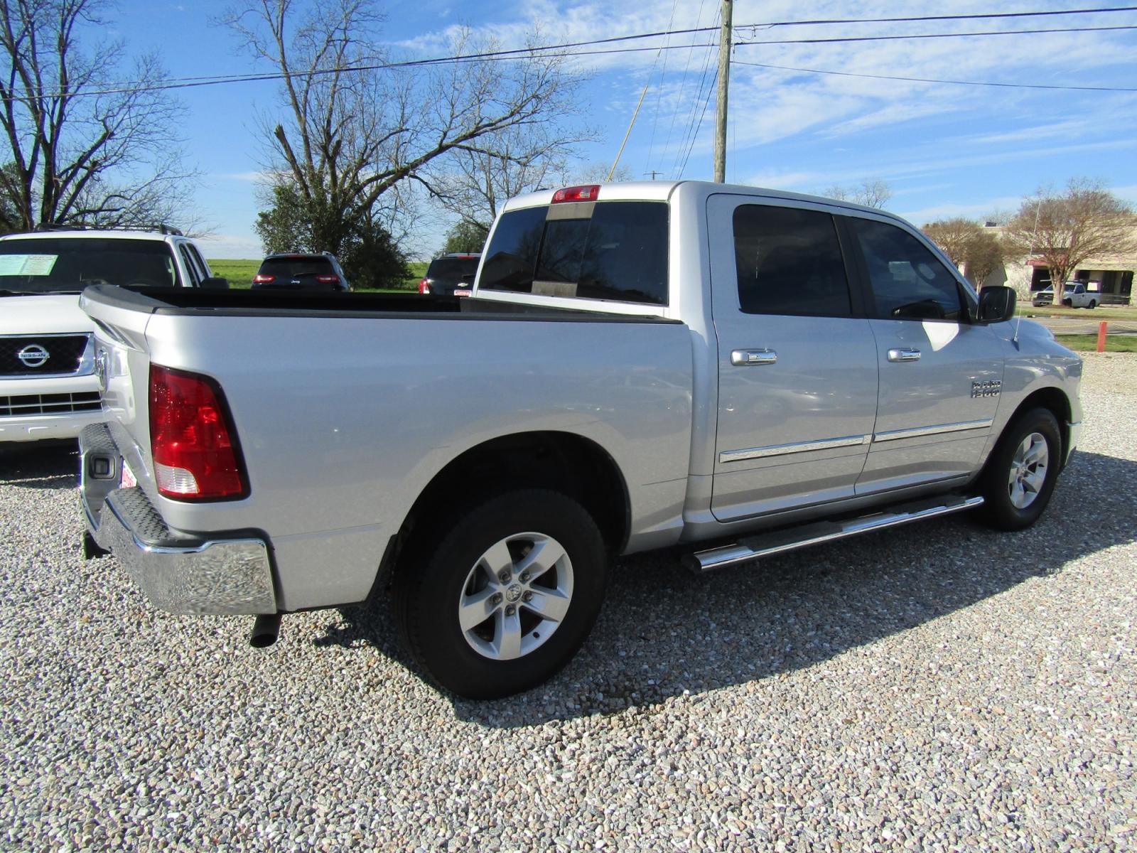 2013 Silver RAM 1500 SLT Crew Cab 2WD (1C6RR6LG9DS) with an 3.6L V6 engine, Automatic transmission, located at 15016 S Hwy 231, Midland City, AL, 36350, (334) 983-3001, 31.306210, -85.495277 - Photo #7